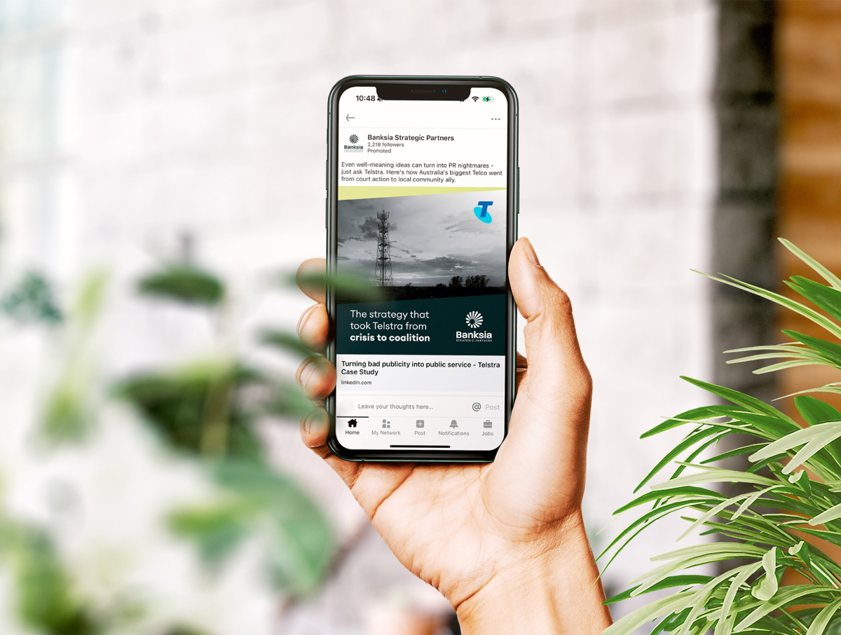 young-business-couple-working-discussing-by-laptop-office-front-their-team 1 align.me case study - Banksia LinkedIn ads